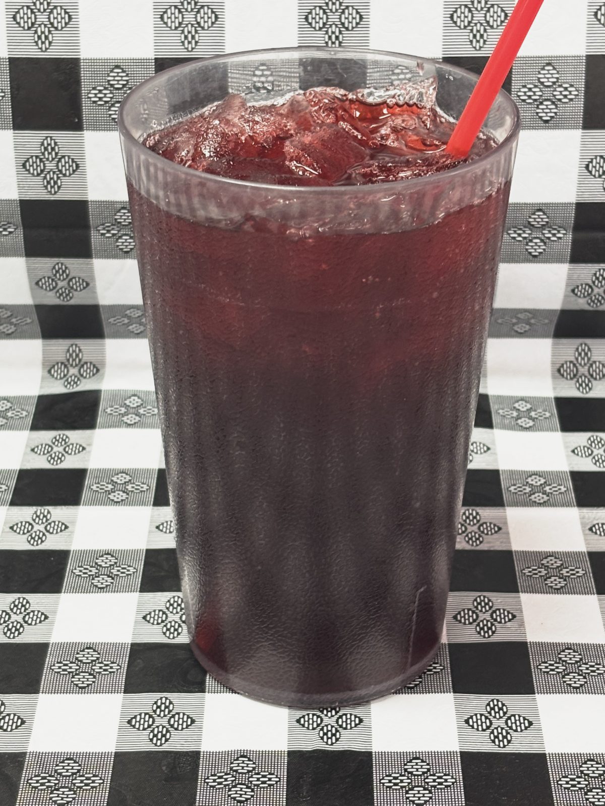 A large cup of jamaica agua fresca